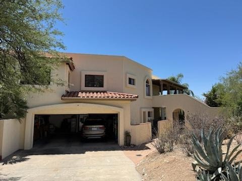 Exterior renovation project — stucco repair and fresh coat