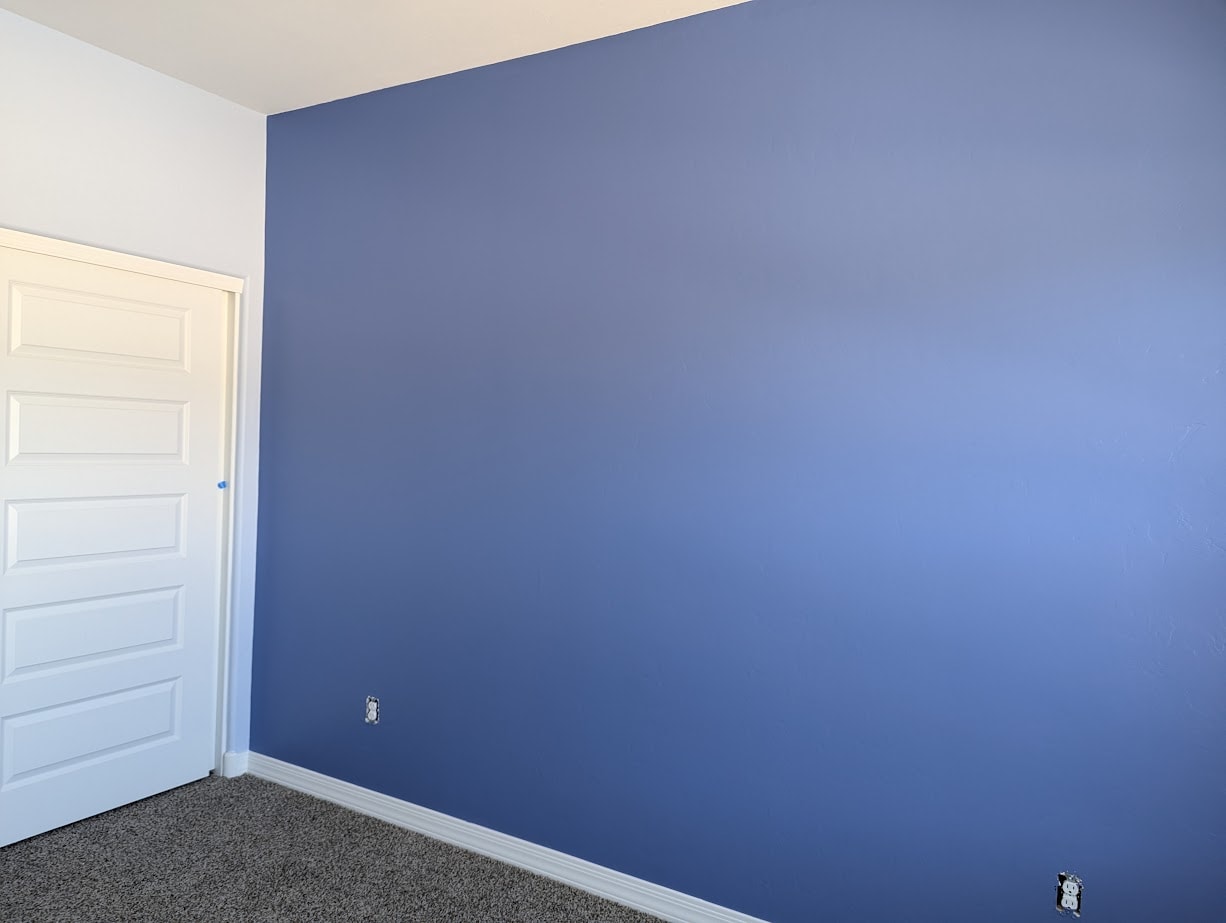 Interior painting project with detailed finish work